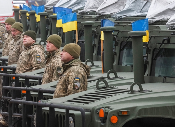 Ukraine marks army day with US hardware and vow to fight off Russia