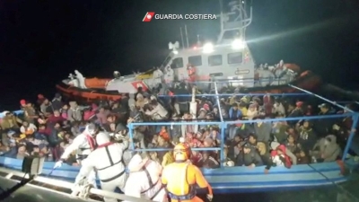 Italy rescues more than 300 migrants from boat in distress