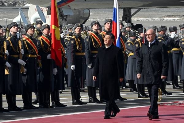 Xi arrives in Moscow calling for pragmatism on Ukraine war